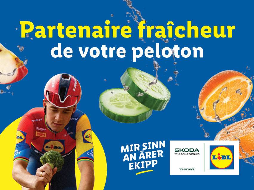Un cycliste avec du brocoli, des fruits et légumes frais, et les logos Lidl et Skoda.