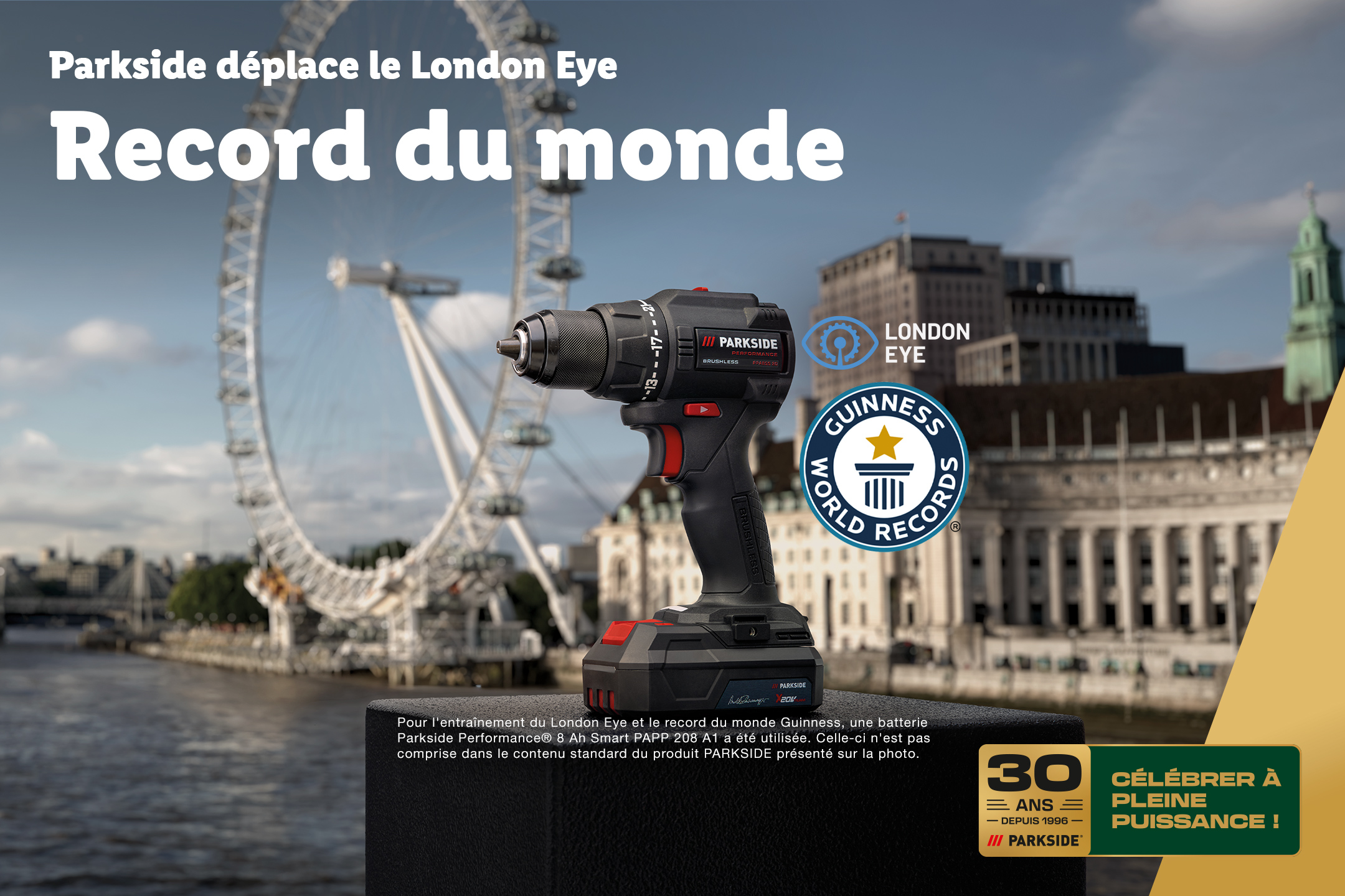 Une perceuse-visseuse sans fil sur fond de London Eye, avec le texte 'Record du monde' et 'Célébrer à pleine puissance'.