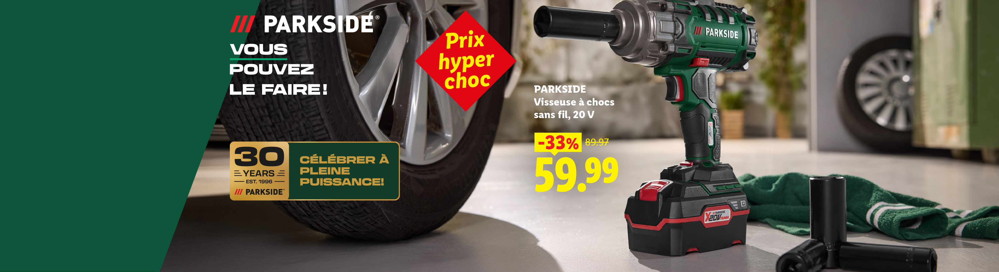 Une visseuse à chocs sans fil de 20 V en promotion, avec un pneu de voiture en arrière-plan.