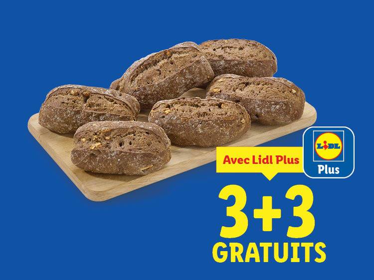 Six pains rustiques sur une planche en bois avec une offre Lidl Plus 3+3 gratuits.