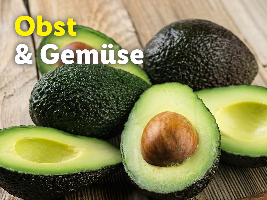Avocados auf Holztisch mit dem Text 'Obst & Gemüse'.