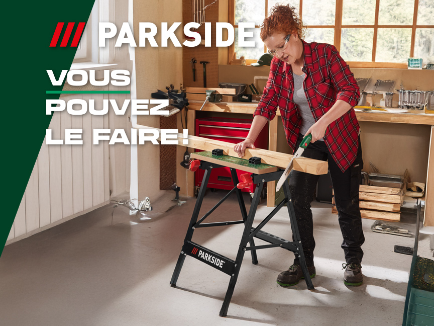 Une femme coupe du bois avec une scie Parkside sur un établi pliant Parkside.